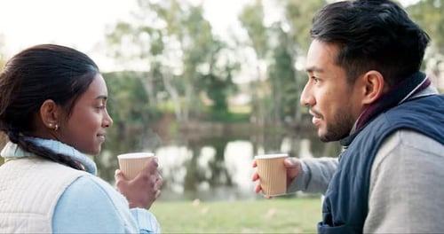 Camping, coffee and couple talking on mountain for bonding, quality time and relax in nature