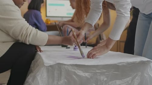 Feminists Drawing Protest Poster Indoors