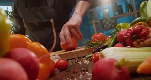 Cutting a tomato in half