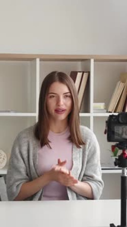Woman Talking to Camera While Filming Video