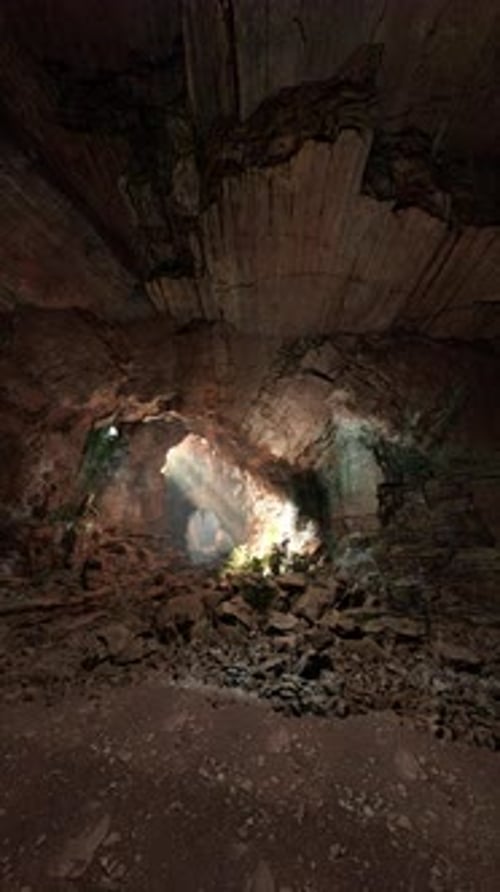Dark Cave Filled With Dirt and Rocks