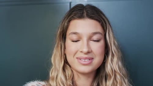 Blonde Woman Smiling in Close Up Portrait
