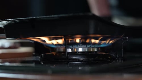 Close Up of Gas is Switching on Appearing Fire Flame Gas Blue Stove Flame Propane Butane in the