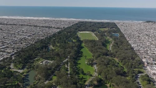 Aerial Panoramic View of Greenery in Golden Gate Park and Dense Town Development in Residential