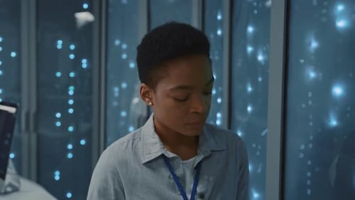 Afroamerican Attractive IT Administrator Digital Office Manager Opening Server Racks Checking