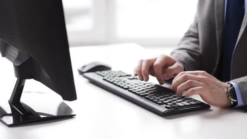 People, Business, Technology and Office Work Concept - Close Up of Businessman