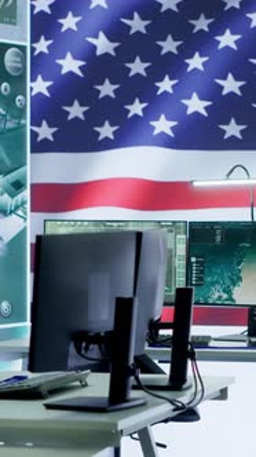 Office with Computer Monitors and American Flag