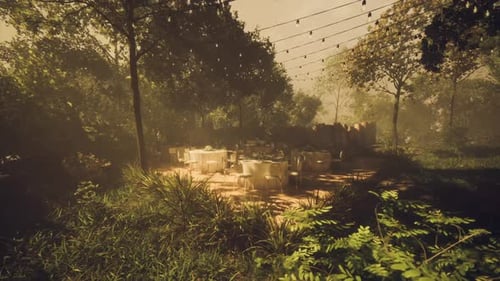 Outdoor Dining Setup in a Serene Garden Space Surrounded By Nature