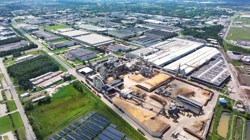 Aerial View of Modern Industrial Park with Solar Panels