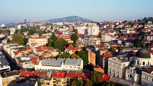 Drone footage of Sarajevo city at sunrise in Bosnia and Herzegovina. Aerial view of the historic