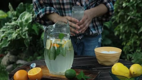 Refreshing Lemonade Pitcher with Citrus and Mint