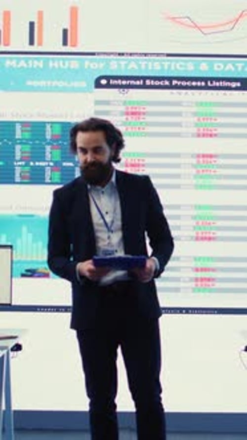 Vertical Video Teammates and Manager Assembling in a Big Data Room to Go Over Their Results