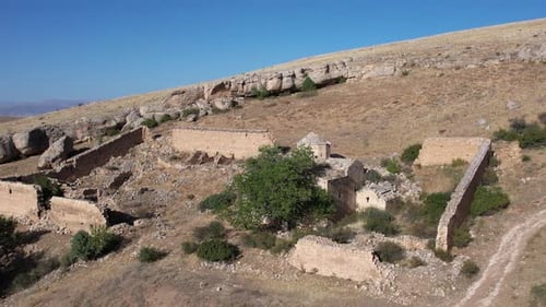 Aerial View Of Historical Church Ruins Area On Mountain Slope