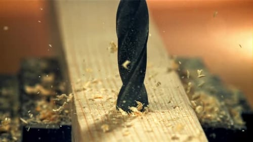 Drilling a Wooden Block in the Workshop Filmed on a Highspeed Camera at 1000 Fps