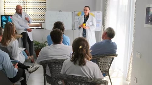 Medical Staff Presentation in Hospital Conference Room