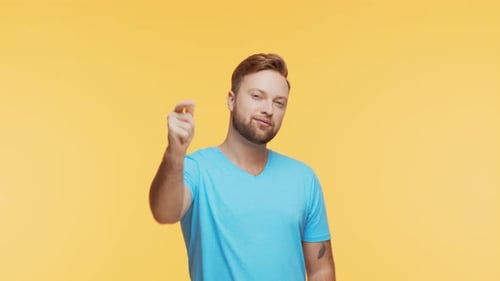 Expressive Young Man Over Vibrant Background Studio Portrait of Handsome Person