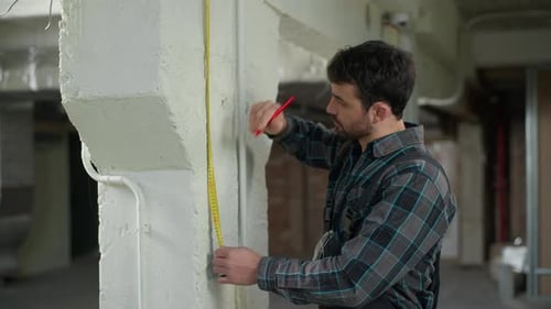 Architect Man Measuring Wall of Building with Ruler Measure Tool Caucasian Guy Builder Male