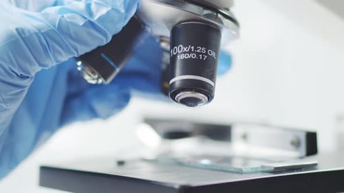 Closeup of Scientific Microscope Laboratory in Hospital Epidemic Disease Healthcare Vaccine Research