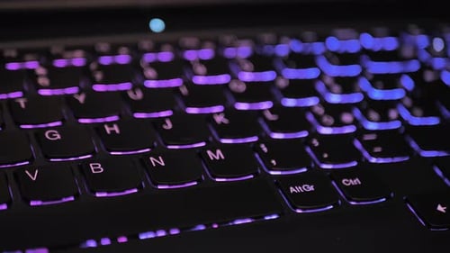 Close Up of Laptop Keyboard Illumination Backlit Keyboard
