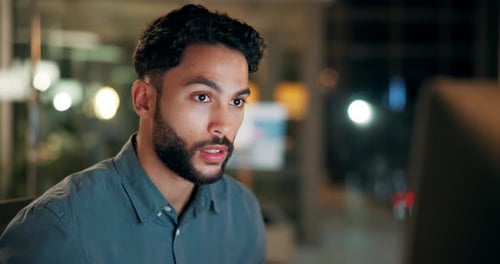 Man, night and coding at computer for information technology, programming