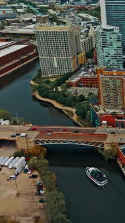 Aerial view of Chicago river and cityscape with urban activity