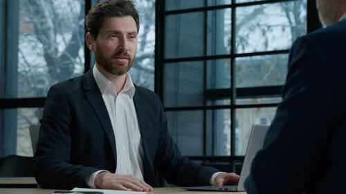 Business Meeting Concludes with a Handshake