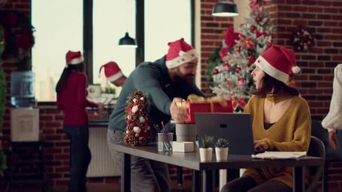 Startup Employees Celebrating Winter Holiday in Festive Office