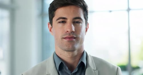 Office, professional and face of business man with company pride, confidence and ambition