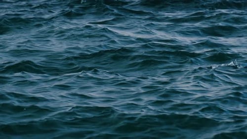 Slow motion of blue sea water surface. The unsurpassed beauty of sea water.