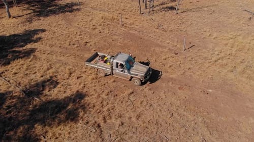 Aerial view of parked landcruiser in outback, Australia.