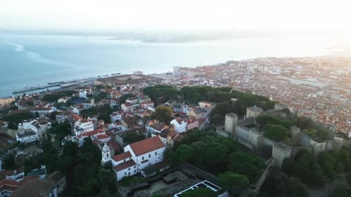 Lisbon, Portugal Aerial drone view of St. George's Castle, Tagus River and rooftops. Lisbon city