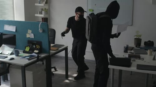 Two Male Thieves Stealing Folder with Secret Corporate Data Breaking into Office