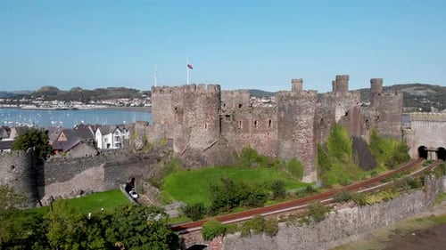 Drone footage of the medieval Conwy castle on a clear summer's day.