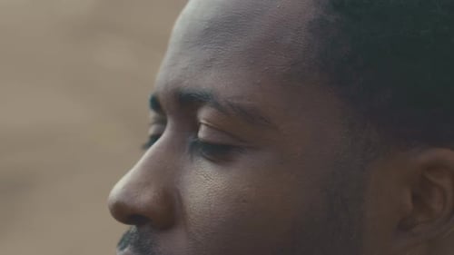 Close Up Portrait of Native African American Man in Desert