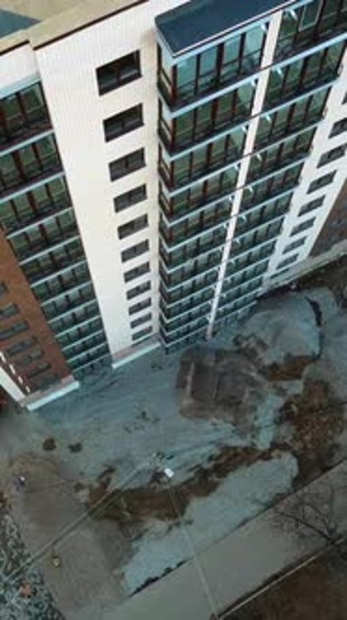 New house construction. Large apartment buildings construction in new district. Vertical video