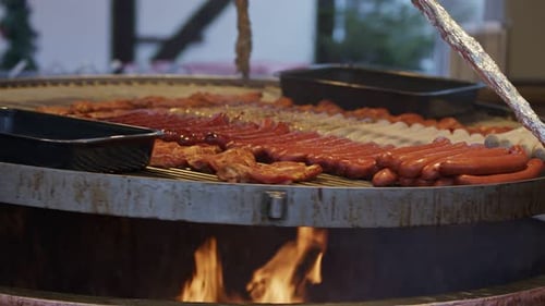 Sausages and Meat Cooked on Fire Grill
