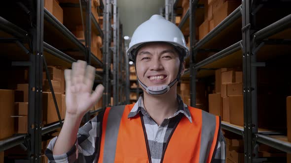 Asian Male Engineer Smiling And Waving Hand Saying Good Bye In The ...