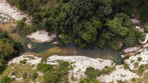 Drone Ascending At The River Stream In Riserva Naturale Orientata Cavagrande Del Cassibile In Syracu