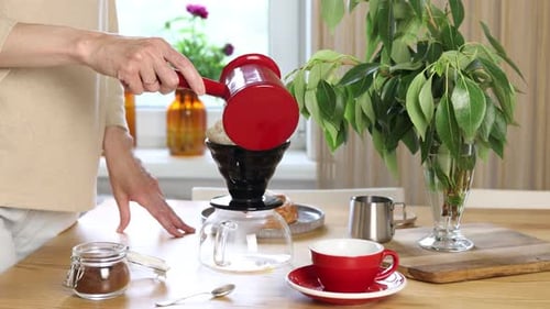Girl Preparing The Filter Coffee Brew In The Private Kitchen 4
