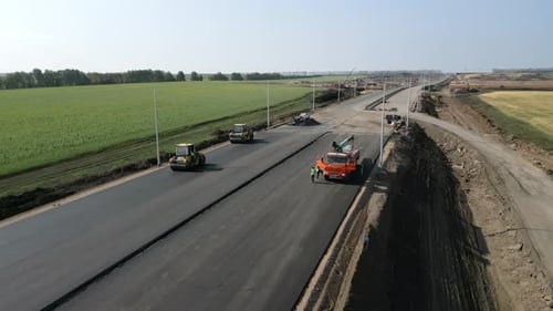 Road Construction Crew Paving New Asphalt Highway Clip