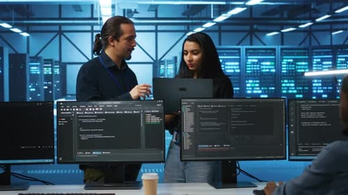 IT Team Collaborate on Coding in Data Center