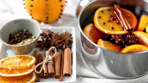 Mulled wine ingredients with orange, cinnamon and star anise