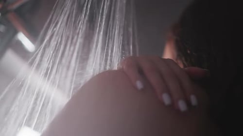 Woman Shoulder Getting Cleaned With Showering Water