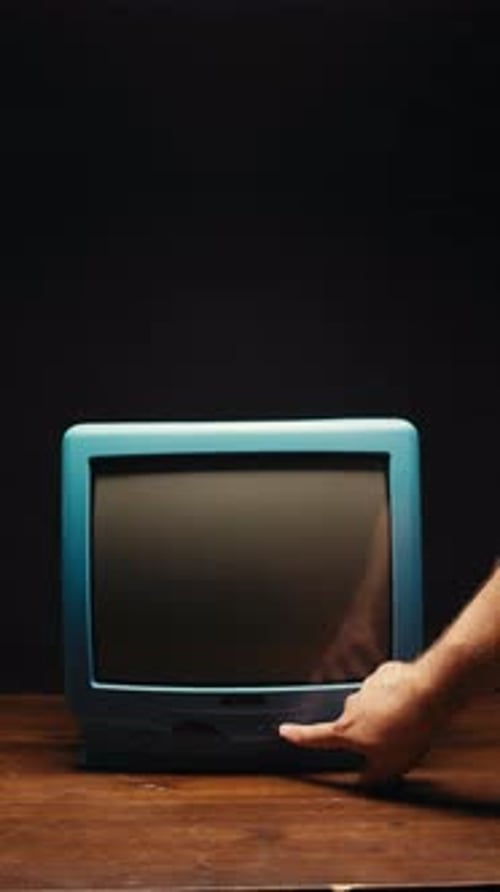 Vintage TV Set Being Switched On And Off