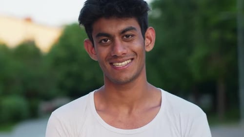 Smiling Young Adult Man in Close Up Portrait