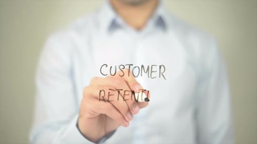 Customer retention, Man Writing on Transparent Screen