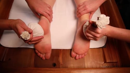 Ayurvedic massage for beautiful woman in spa