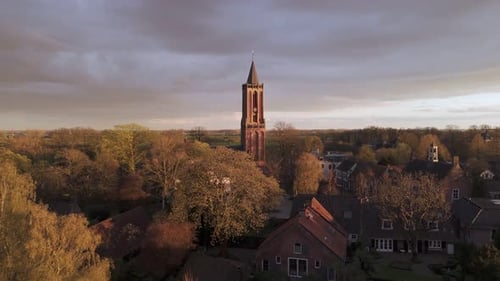 Amerongen Evening Glow: Picturesque Village and Church Against Beautiful Twilight Sky