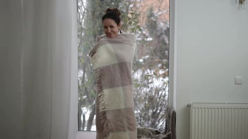 Cozy Moments By the Window in Winters Embrace a Time for Reflection and Tranquility