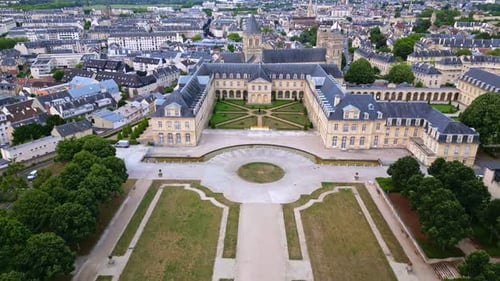 Ladies Abbey of Sainte-Trinité with Michel D'Ornano park, Caen in Normandy, France. Aerial drone vie